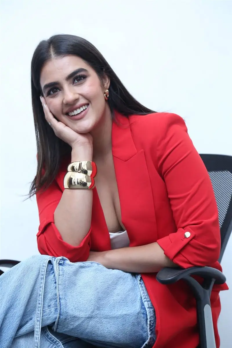 Kavya Thapar in Red Top Blue Jeans